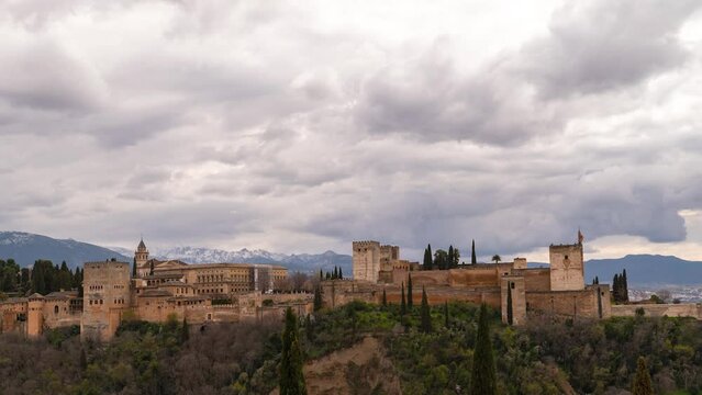 Tilt up time-lapse over famous Alhambra Palace in Granada, Spain