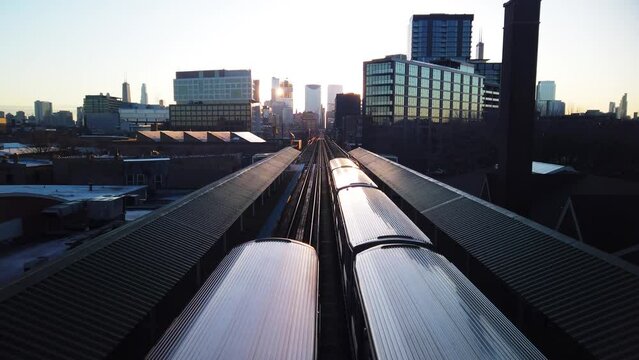 Sunrise Over City Of Chicago Subway Station With Two Trains