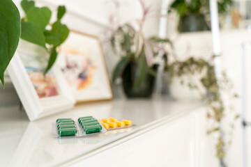 Pharmaceuticals antibiotics pills medicine in the home space with copy space