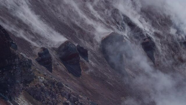 Caldera of Avachinsky stratovolcano, also known as Avacha Volcano. Swinging steam from hot geysers. Kamchatka Peninsula, Russia.