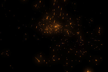 Spark Overlays. Burning red hot sparks fly from large fire in night sky. Burning embers glowing flying away particles over black background. Beautiful abstract background on the theme of fire, light.