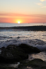 Sunset in splashy water