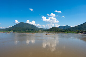 Lanscape riverside of Mae Khong river and mountain views border of Thailand and Laos at the Kaeng Khud Khu rapids at Chiang Khan in Loei province, Thailand.