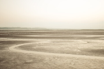 Naklejka premium misty beach in the morning