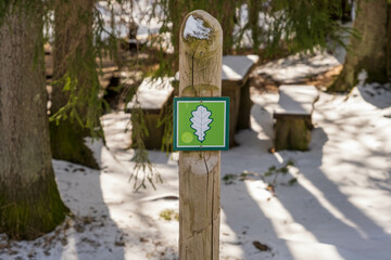 nature reserve, park sign with oak leaves. In Latvia