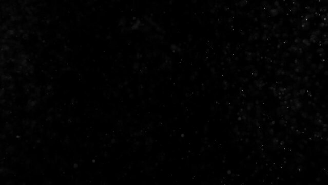 Super Slow Motion Shot of Summer Shower Isolated on Black Background at 1000 fps.
