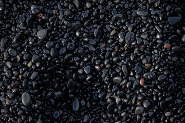 shiny pebbles close up in iceland