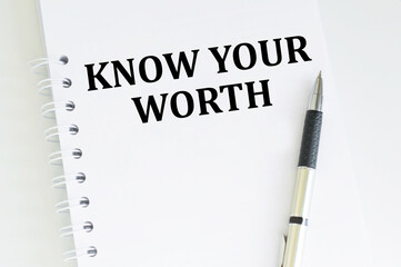 Know your worth inscription on a notebook on a light background, a business concept