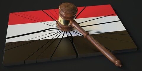 Judge's gavel and broken block with flag of Yemen. Conceptual 3d rendering