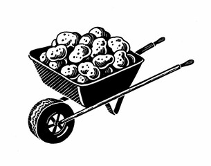 wheelbarrow full of potatoes - obrazy, fototapety, plakaty
