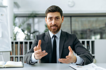 Confident successful Caucasian man, entrepreneur, lawyer, manager, sits in a modern office, in...