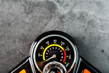 Air pump manometer for monitoring tire pressure on a dark background with free space