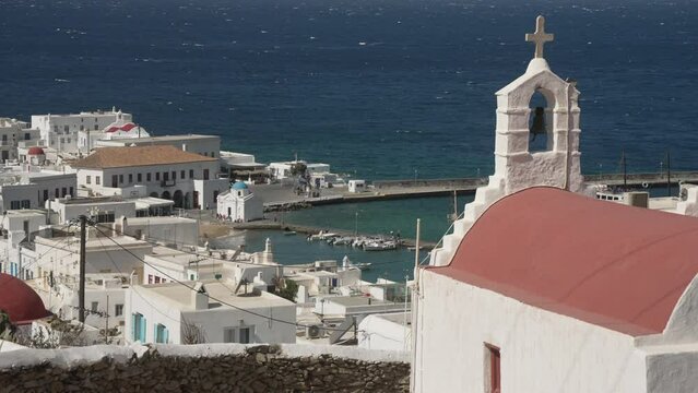 Little white chapel and old harbour from elevated position, Mykonos Town, Mykonos, Cyclades, Greek Islands