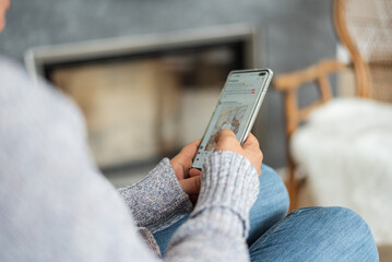 point finger on screen mobile phone closeup, person texting text message, hipster touch blue screen on smartphone light night city, girls using in hands cellphone close up, online internet - obrazy, fototapety, plakaty