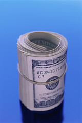 Close-up of a roll of American dollar bills