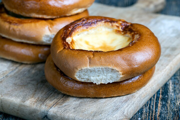 sweet dough pastries with sour cream and milk filling