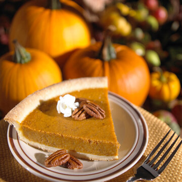 High angle view of pumpkin pie slice on a plate