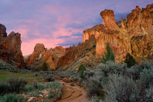 Rock formations on a landscape, Leslie Gulch, Oregon, USA