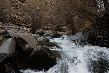 view of the mountain river and basalt pillars