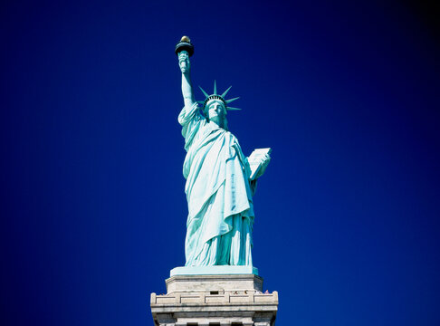 Low angle view of a statue, Statue of Liberty, New York City, New York, USA - Powered by Adobe