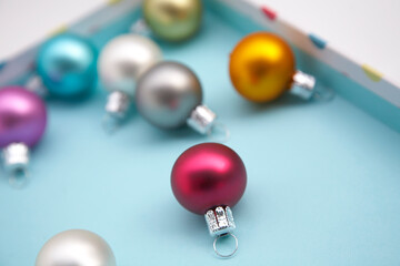 Close-up of Christmas balls in a box lid