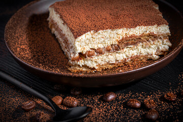 a piece of tiramisu topped with coca