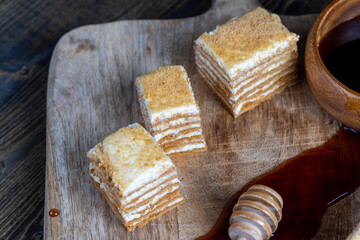 cake made of thin honey cakes and a thin creamy layer