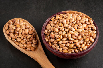 Raw pinto beans on the table.