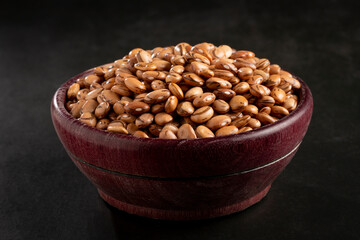 Raw pinto beans on the table.