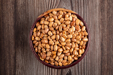 Raw pinto beans on the table.