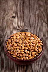 Raw pinto beans on the table.