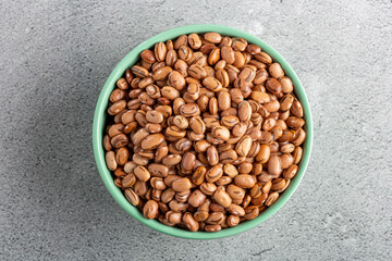 Raw pinto beans on the table.