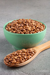 Raw pinto beans on the table.