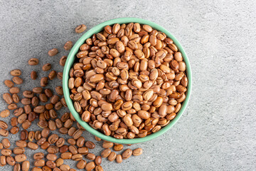 Raw pinto beans on the table.