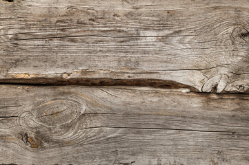  Naturalne tło niejednolitych starych grubych drewnianych desek z teksturą korozji drewna.. Kolory brązu., szary Tapeta.
