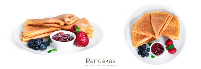 Pancakes with berry jam isolated on a white background. Pancakes with strawberries and blueberries on white plate.
