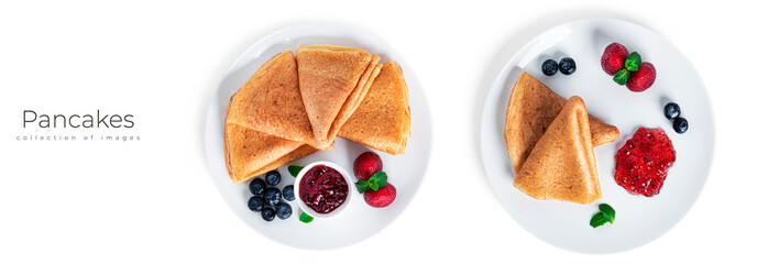 Pancakes with berry jam isolated on a white background. Pancakes with strawberries and blueberries...