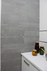 Modern interior design, room with gray tiles, seamless, luxurious background.