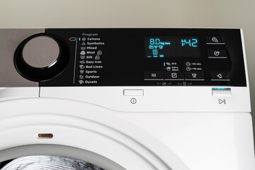 Clothing dryer machine control panel, close up. Program for cottons displaying.