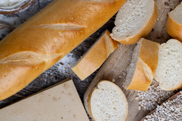 pieces of wheat baguette on a cutting board