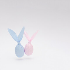 Easter bunny paper gift egg wrapping diy idea. Minimal Easter concept. With copy space.