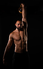 Fototapeta premium Lifting the dumbbell high