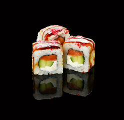 rolls on a black background with reflection