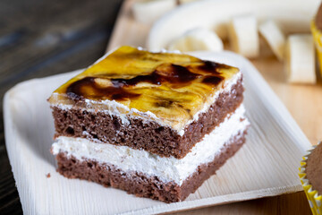 a piece of banana cake and fresh sliced bananas
