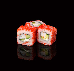 rolls on a black background with reflection