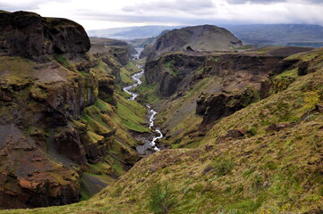 Landscape of canyon and river in Thorsmork, Iceland. Laugavegur trail from Skogar to Thorsmork in cloudy day, Landmannalaugar, Icelandic highlands. Volcanic canyon in Thorsmork, Iceland.