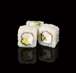 rolls on a black background with reflection