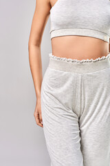 A young girl in a yoga suit