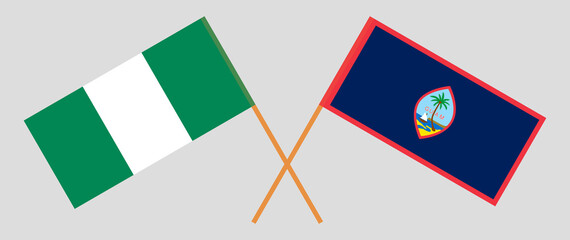 Crossed flags of Nigeria and Guam. Official colors. Correct proportion