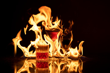 A Liquor trio of wine, Irish coffee and tasty Bourbon with golden flames flowing in the background...